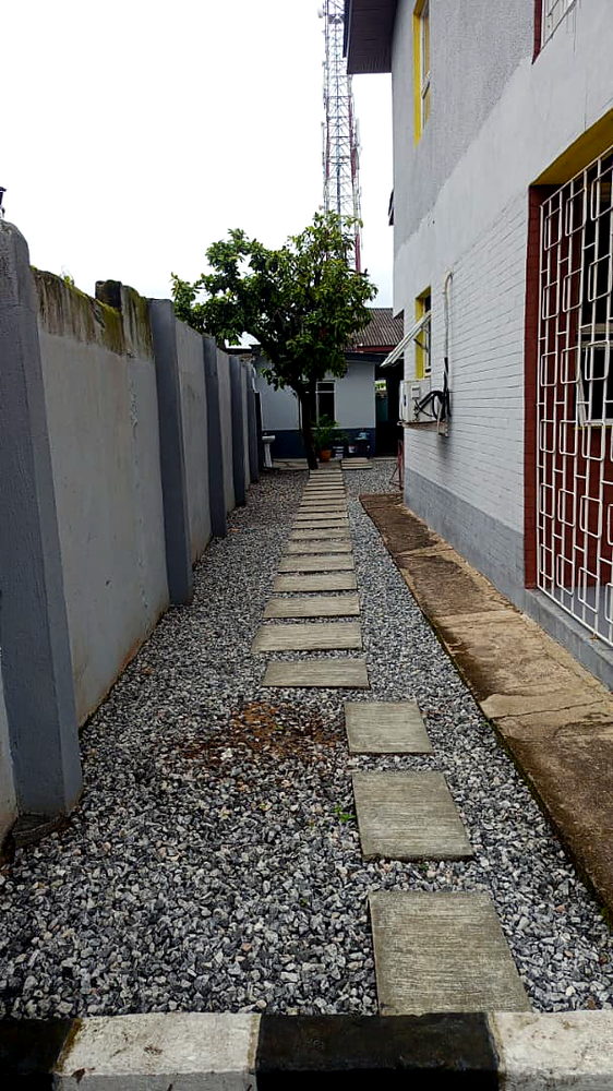 Granite walkway leading to the primary class blocks at Flourish Playhouse